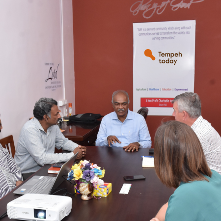 Commercial, R&D and quality teams discussing an industrial tempeh project